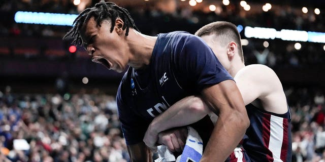 Fairleigh Dickinson forward Sean Moore reacts after a basket against Purdue during the NCAA Tournament Friday, March 17, 2023, in Columbus, Ohio.