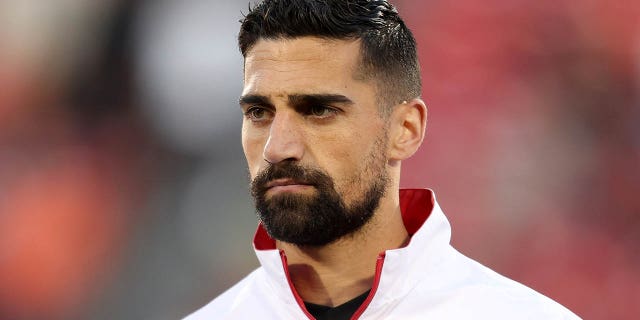 Sebastian Lletget #12 of FC Dallas stands for the national anthem before to the MLS game between Sporting Kansas City and FC Dallas at Toyota Stadium on March 18, 2023 in Frisco, Texas.