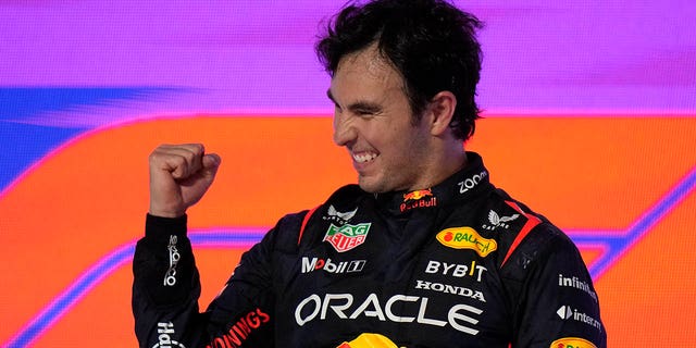 Red Bull driver Sergio Perez of Mexico celebrates after he won the Saudi Arabia Formula One Grand Prix at the Jeddah corniche circuit in Jeddah, Saudi Arabia, Sunday, March 19, 2023. 