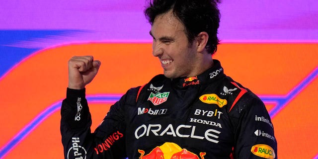 Red Bull driver Sergio Perez of Mexico celebrates after he won the Saudi Arabia Formula One Grand Prix at the Jeddah corniche circuit in Jeddah, Saudi Arabia, Sunday, March 19, 2023.