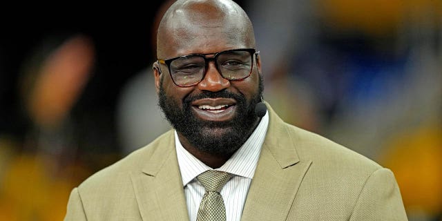 Television analyst Shaquille O'Neal watches before Game 2 of the 2022 NBA Finals between the Golden State Warriors and the Boston Celtics at the Chase Center in San Francisco, June 5, 2022.