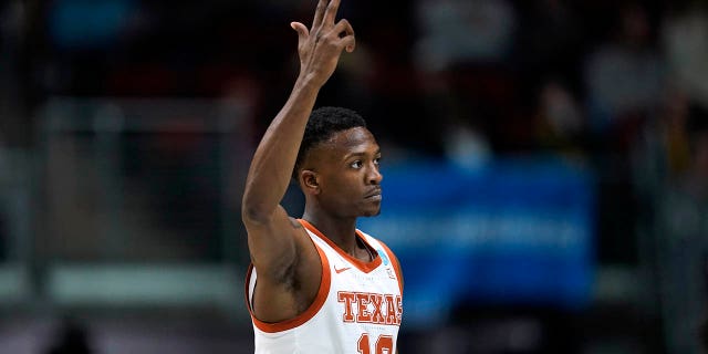 Texas guard Sir'Jabari Rice celebrates after making a 3-point basket in the first half of a first-round college basketball game against Colgate in the NCAA Tournament, Thursday, March 16, 2023, in Des Moines, Iowa.