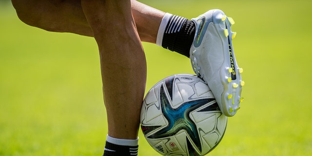 A general view of soccer shoes and a soccer ball during a training session at the Smaragd Arena on Day 3 of the FC Red Bull Salzburgs training camp on June 27, 2022 in Bramberg, Austria.