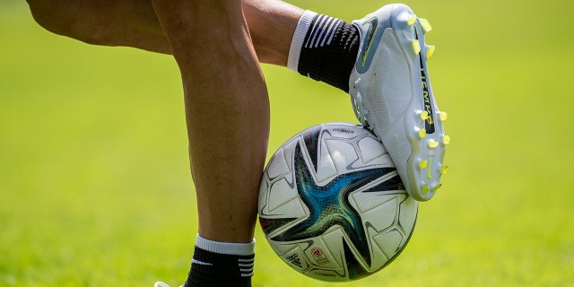 A general view of soccer shoes and a soccer ball during a training session at the Smaragd Arena on Day 3 of the FC Red Bull Salzburgs training camp on June 27, 2022 in Bramberg, Austria.