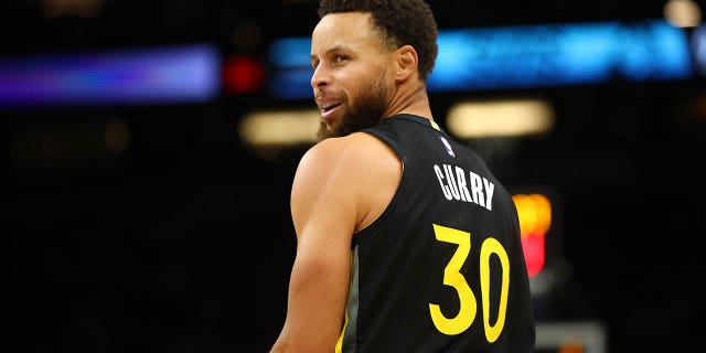 Detail view of the jersey of Golden State Warriors guard Stephen Curry, #30, against the Phoenix Suns at the Footprint Center in Phoenix on November 16, 2022.