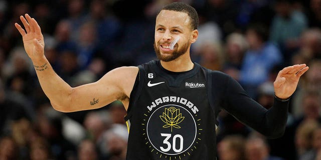 Golden State Warriors guard Stephen Curry, #30, concedes his foul against the Minnesota Timberwolves in the first quarter at Target Center on February 1, 2023 in Minneapolis.