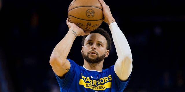 Golden State Warriors guard Stephen Curry, #30, shoots during warmups before the game against the Brooklyn Nets at the Chase Center in San Francisco on January 22, 2023.