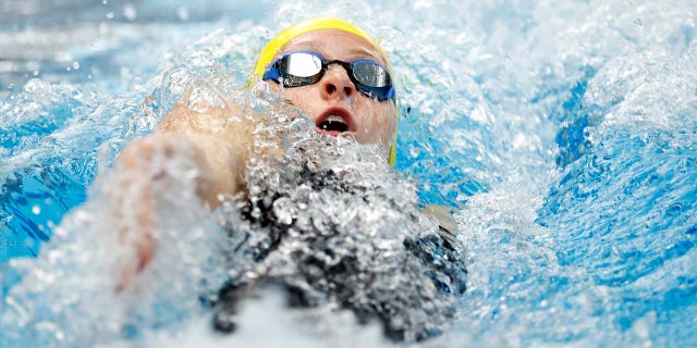 Summer McIntosh competes in the women's 200m backstroke during the Toyota US Open at the Greensboro Aquatic Center on December 3, 2022 in Greensboro, North Carolina.