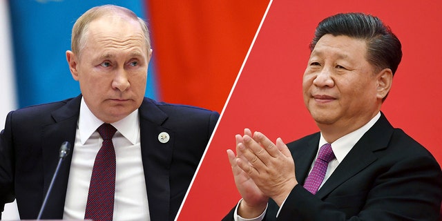El presidente chino, Xi Jinping, aplaude mientras escucha al presidente ruso, Vladimir Putin, a través de un enlace de video en Beijing el 2 de diciembre de 2019.