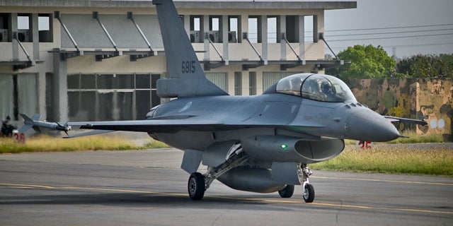 A U.S.-made F-16 V fighter taxis on the runway at an air force base in Chiayi County, Taiwan, on March 25, 2023. The country said Friday it used planes and ships to respond to Chinese aircraft that crossed the Taiwan Strait median line, according to Reuters.