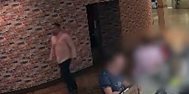 Police say a cop impersonator at a Florida Ramada pushed a woman into a stairwell and exposed himself.