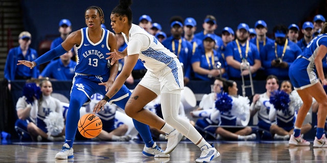 Tatyana Wyche #2 of the Florida Gators dribbles against Ajae Petty #13 of the Kentucky Wildcats in the second quarter during the first round of the SEC Women's Basketball Tournament at Bon Secours Wellness Arena on March 1, 2023 in Greenville, SC South.