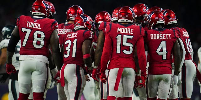 The Texans huddle against the Philadelphia Eagles at NRG Stadium on Nov. 3, 2022, in Houston.