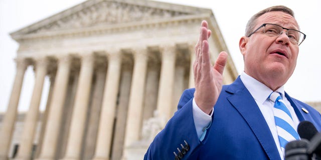North Carolina House Speaker Tim Moore speaks in front of the Supreme Court in Washington on Dec. 7, 2022. North Carolina legislators repealed the state’s requirement that residents need to obtain a permit to buy guns on March 29, 2023.