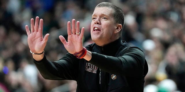 Fairleigh Dickinson head coach Tobin Anderson points to Purdue at the NCAA Tournament, Friday, March 17, 2023, in Columbus.