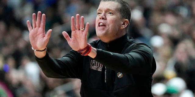 Fairleigh Dickinson head coach Tobin Anderson signals against Purdue in the NCAA Tournament, Friday, March 17, 2023, in Columbus.
