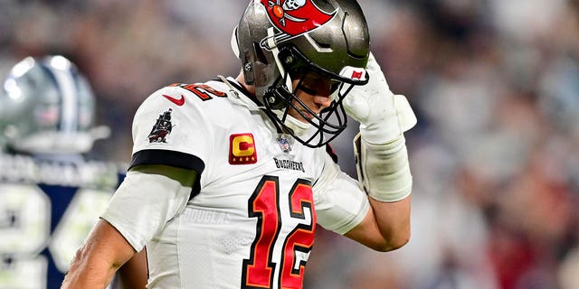 Tom Brady of the Buccaneers reacts after a sack in the NFC wild-card playoff game against the Dallas Cowboys at Raymond James Stadium on Jan. 16, 2023, in Tampa, Florida.