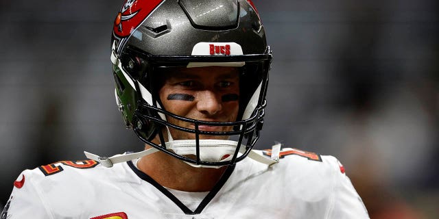 Tom Brady of the Tampa Bay Buccaneers warms up before the Saints game at Caesars Superdome on Sept. 18, 2022, in New Orleans.