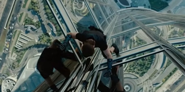Tom Cruise scaling the side of the Burj Khalifa as part of a stunt for "Mission Impossible: Ghost Protocol"