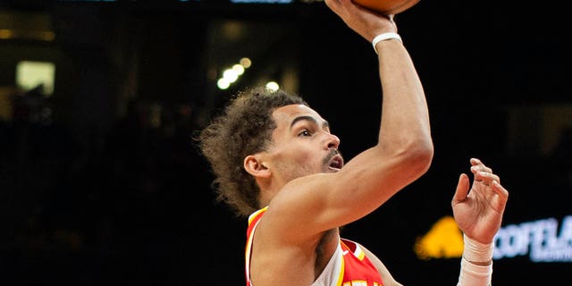 Atlanta Hawks guard Trae Young shoots during the second half of a game against the Indiana Pacers March 25, 2023, in Atlanta.