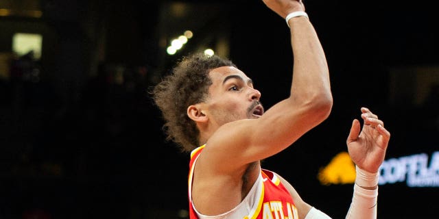 Atlanta Hawks guard Trae Young shoots during the second half of their game against the Indiana Pacers March 25, 2023 in Atlanta.