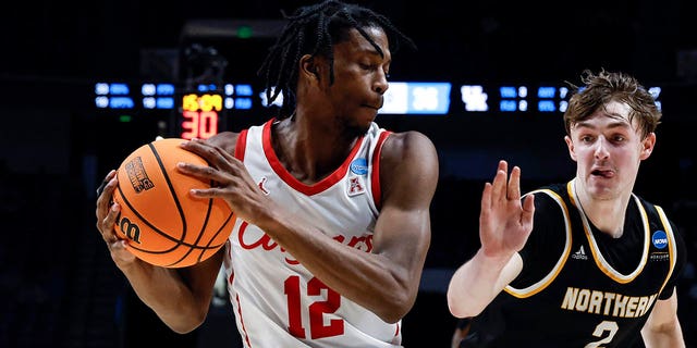 Houston guard Tramon Mark (12) grabs a rebound from Northern Kentucky guard Sam Vinson (2) during the second half of a first round college basketball game in the Men's NCAA Tournament in Birmingham, Alabama, on Thursday, March 16, 2023.