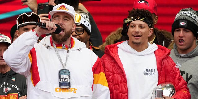 Travis Kelce and Patrick Mahomes of the Chiefs celebrate during the Super Bowl LVII victory parade on February 15, 2023 in Kansas City, Missouri.