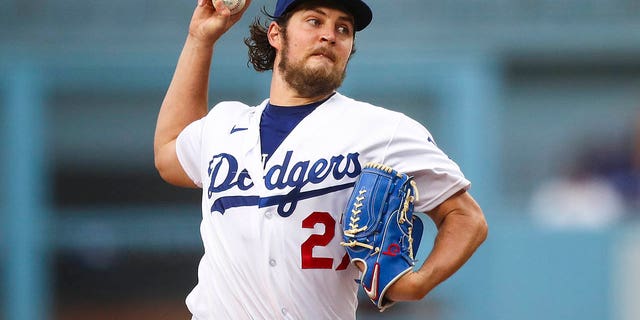 Trevor Bauer, #27 of the Los Angeles Dodgers, pitches in the first inning against the San Francisco Giants at Dodger Stadium on June 28, 2021 in Los Angeles.