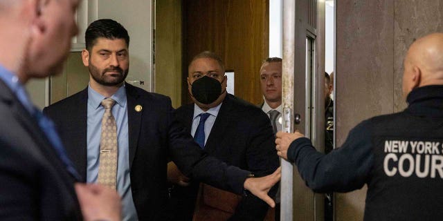 Manhattan District Attorney Alvin Bragg exits Manhattan Criminal Court successful New York connected Friday.