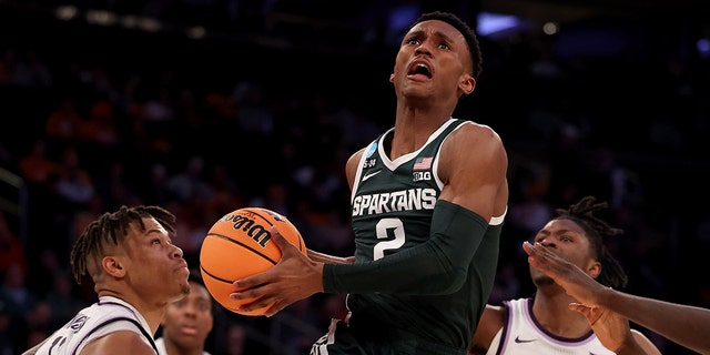 Tyson Walker #2 of the Michigan State Spartans shoots the ball against the Kansas State Wildcats during the first half in the Sweet 16 round game of the NCAA Men's Basketball Tournament at Madison Square Garden on March 23, 2022 in New York City. 