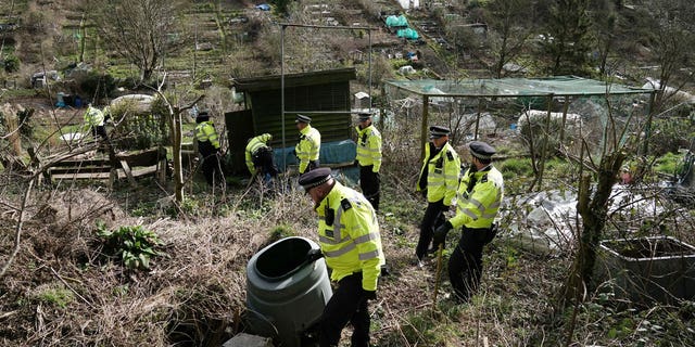 Police officers work on an urgent search operation to find the missing baby of Constance Marten, who has not received medical attention since birth in early January, at Roedale Valley Allotments, Brighton, 28 February 2023. 