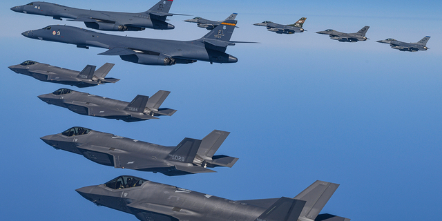 U.S. Air Force B-1B bombers fly in formation with South Korean Air Force F-35A fighters and U.S. Air Force F-16s during a military exercise in South Korea, Sunday, March 19, 2023. 