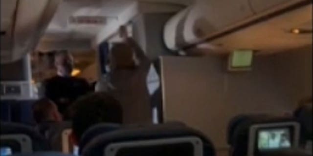 Man attempting to stab the stewardess on a United flight from LA to Boston.
