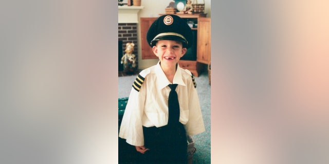 Cole Kaynor, pictured as a child, grew up watching his father fly planes — but didn't think that would be his own path as an adult. 