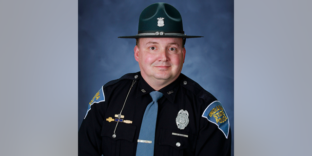 Indiana State Police Public Information Officer Brian Walker said during a Friday night press conference that Master Trooper James Bailey, 50, was hit by the suspect's car at around 4:30 p.m. on Interstate 69, just south of Auburn, Indiana.