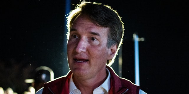 Virginia Gov. Glenn Youngkin is seen during an early vote rally with Yesli Vega, Republican candidate for Virginia's 7th Congressional district, at the Brandy Station, Va., fire station on Nov. 1, 2022. 