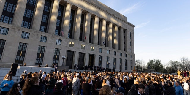 A crowd gathers outside the courthouse and City Hall for a vigil held for victims of The Covenant School shooting on Wednesday, March 29, 2023, in Nashville, Tennessee.