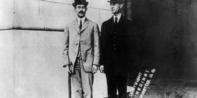 Portrait of the Wright Brothers, the first to develop powered flight with more force than air. Wilbur stands on the left.