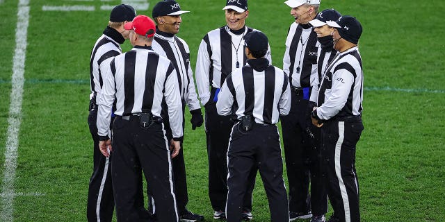 A general view as referees huddle on the field before the XFL game between the DC Defenders and Vegas Vipers at Audi Field on March 12, 2023 in Washington, DC