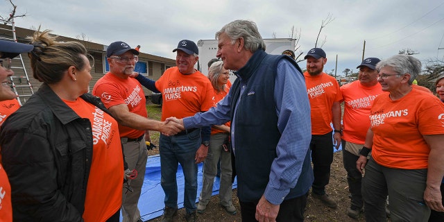 Scores of volunteers with Samaritan's Purse are on the ground in Mississippi to help those in need; Rev. Graham met and prayed with many of them.