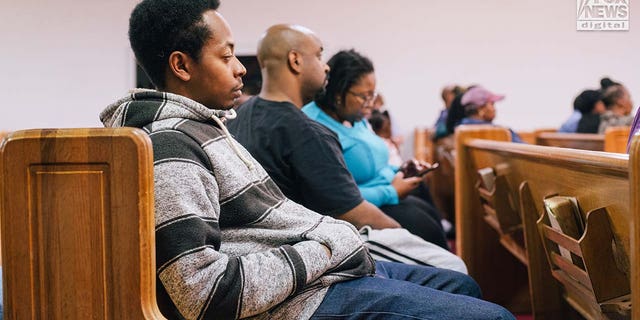 Friends, family, and church members mourn the loss of Zindell Brown at a church in Scranton, South Carolina, on Wednesday, March 8, 2023. 