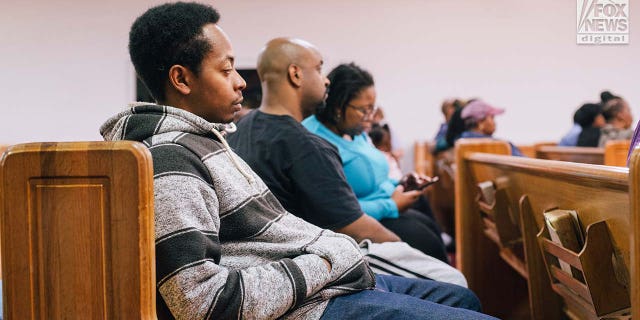 Friends, family, and church members mourn the loss of Zindell Brown at a church in Scranton, South Carolina, on Wednesday, March 8, 2023. 