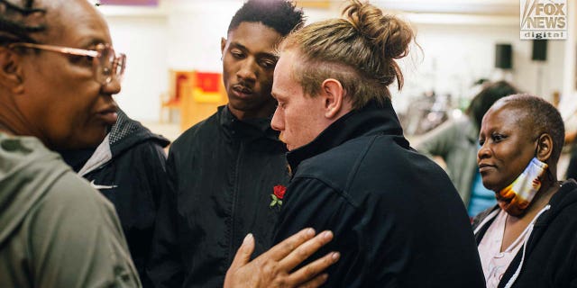 Friends of Zindell Brown mourn his loss at a prayer vigil at Word of God Outreach Ministries in Scranton, South Carolina, on March 8, 2023.