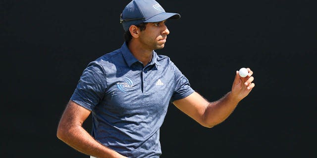 Aaron Rai of England reacts to a par putt on the eighth green during the first round of the Arnold Palmer Invitational presented by Mastercard at Arnold Palmer Bay Hill Golf Course on March 2, 2023, in Orlando, Florida.