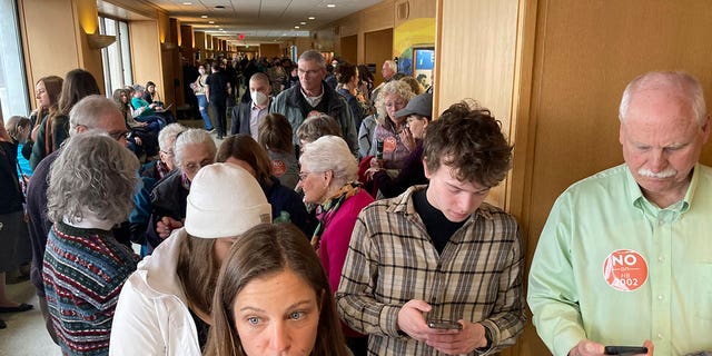 People line up on March 20, 2023, outside a hearing room in the Oregon State Capital in Salem, where a public hearing was being held on a bill aiming to expand access to abortion and gender-affirming care.