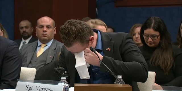 Marine Sgt. Tyler Vargas-Andrews breaks down while testifying before the House Foreign Affairs Committee.