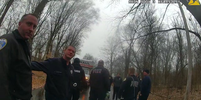 Akron, Ohio, police investigate after two bodies were found bound, gagged and executed in a secluded wooded area.