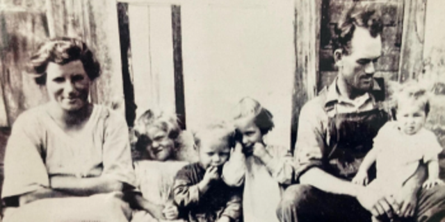 Art Palmer's family experienced the Dust Bowl in South Dakota. Art is the boy with his fingers in his mouth.