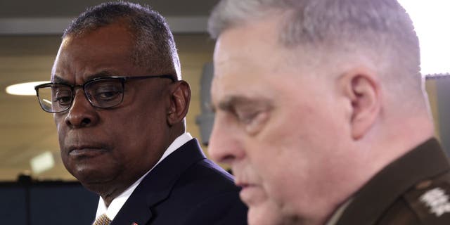 Secretary of Defense Lloyd Austin, left, and Joint Chiefs of Staff Chairman Gen. Mark Milley have been accused by Republicans of worrying too much about social policies and not enough about recruiting and warfighting. (Alex Wong / Getty Images)