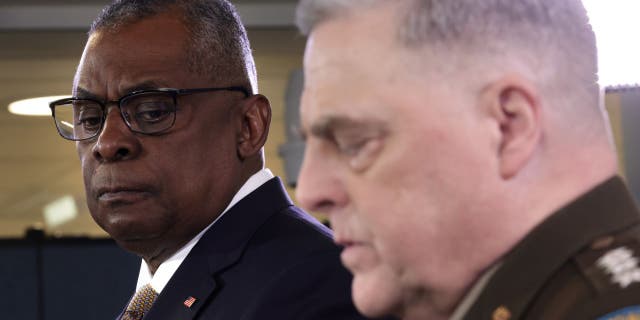 Secretary of Defense Lloyd Austin, left, and Joint Chiefs of Staff Chairman Gen. Mark Milley have been accused by Republicans of worrying too much about social policies and not enough about recruiting and warfighting. (Alex Wong / Getty Images)